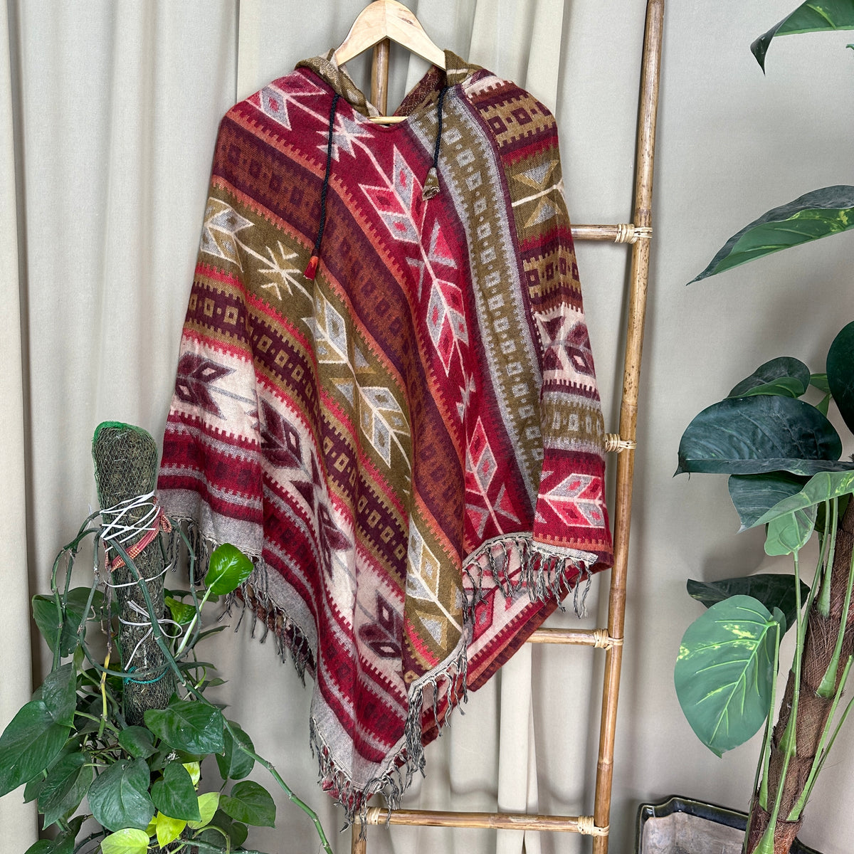 Unisex Yak Wool Blend Hooded Poncho in black red pink blue geometric