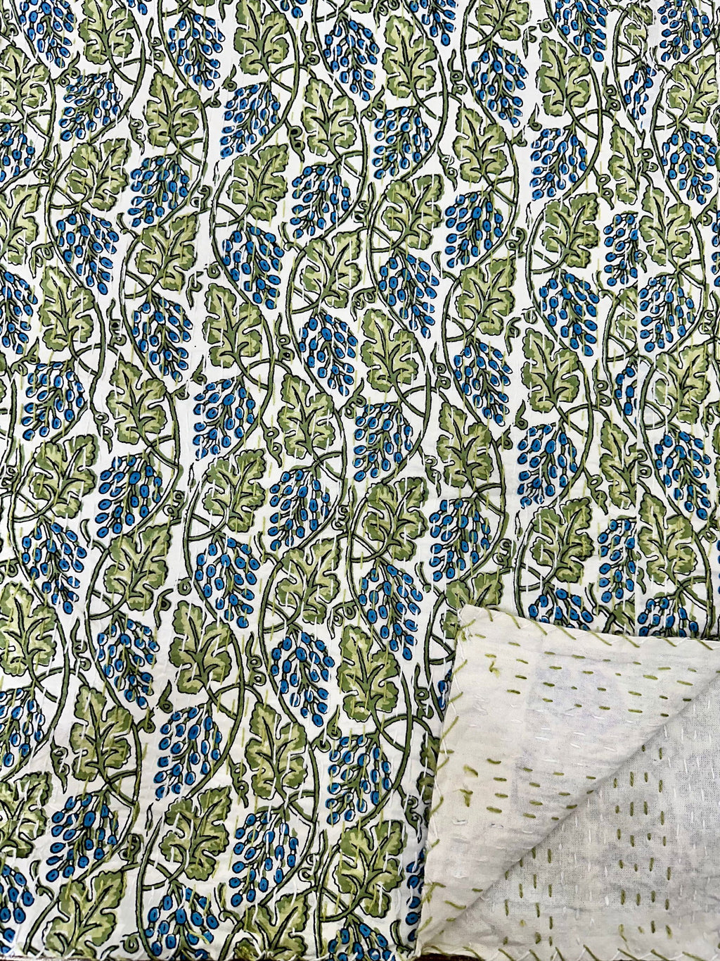 reversible Kantha-stitched block-printed Cotton Throw in white green leaf