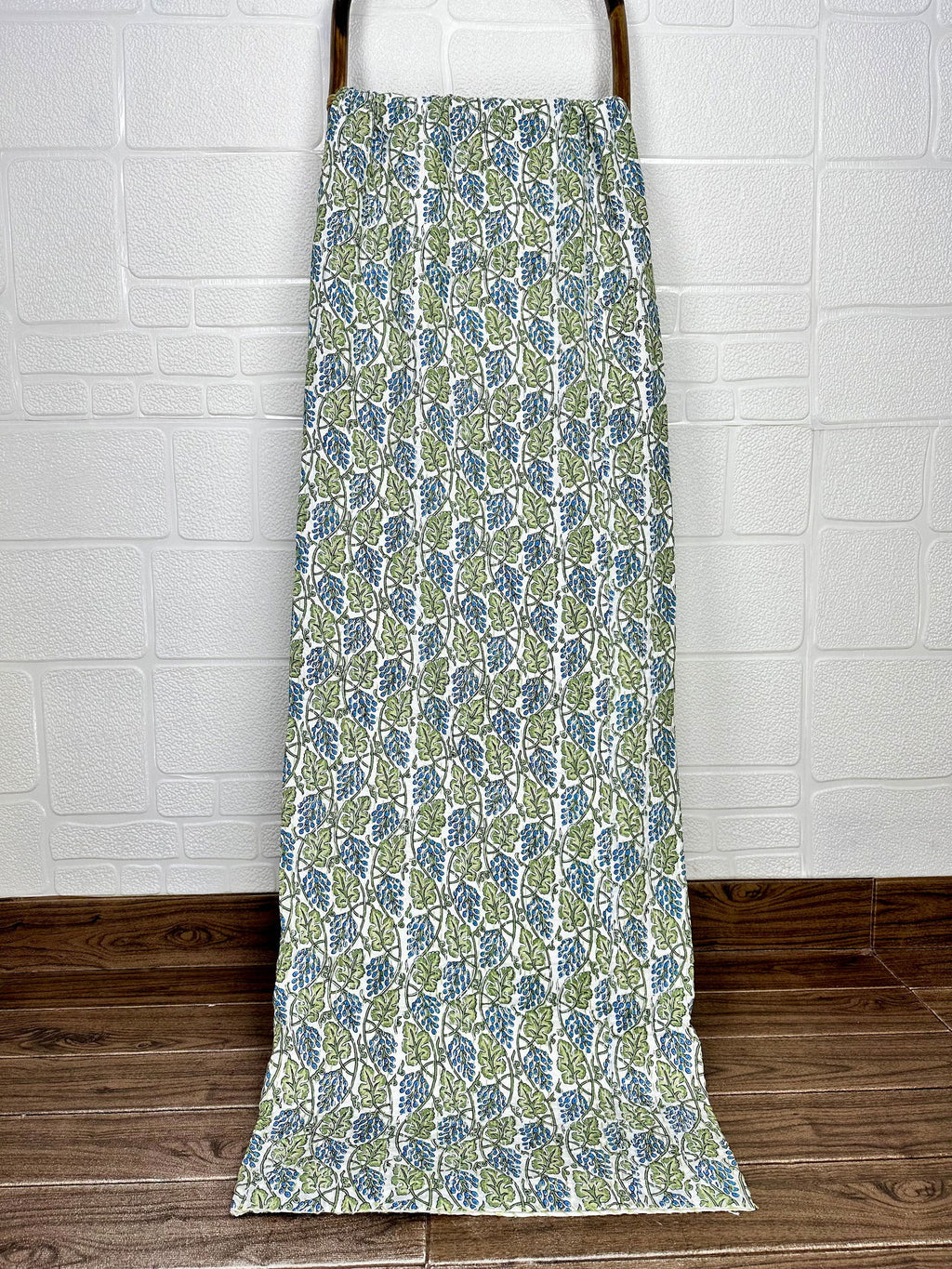 reversible Kantha-stitched block-printed Cotton Throw in white green leaf