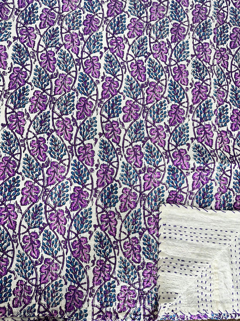reversible Kantha-stitched block-printed Cotton Throw in white purple leaf