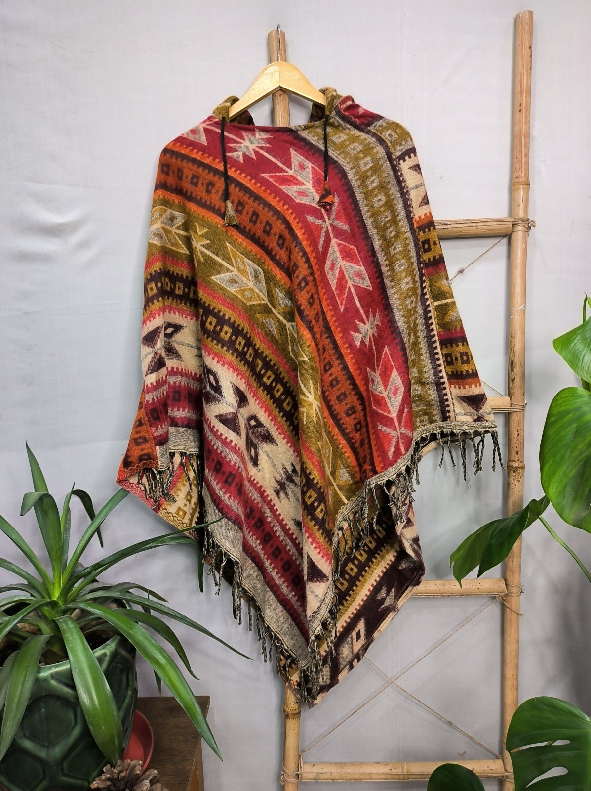 Unisex Yak Wool Blend Hooded Poncho in black red pink blue geometric