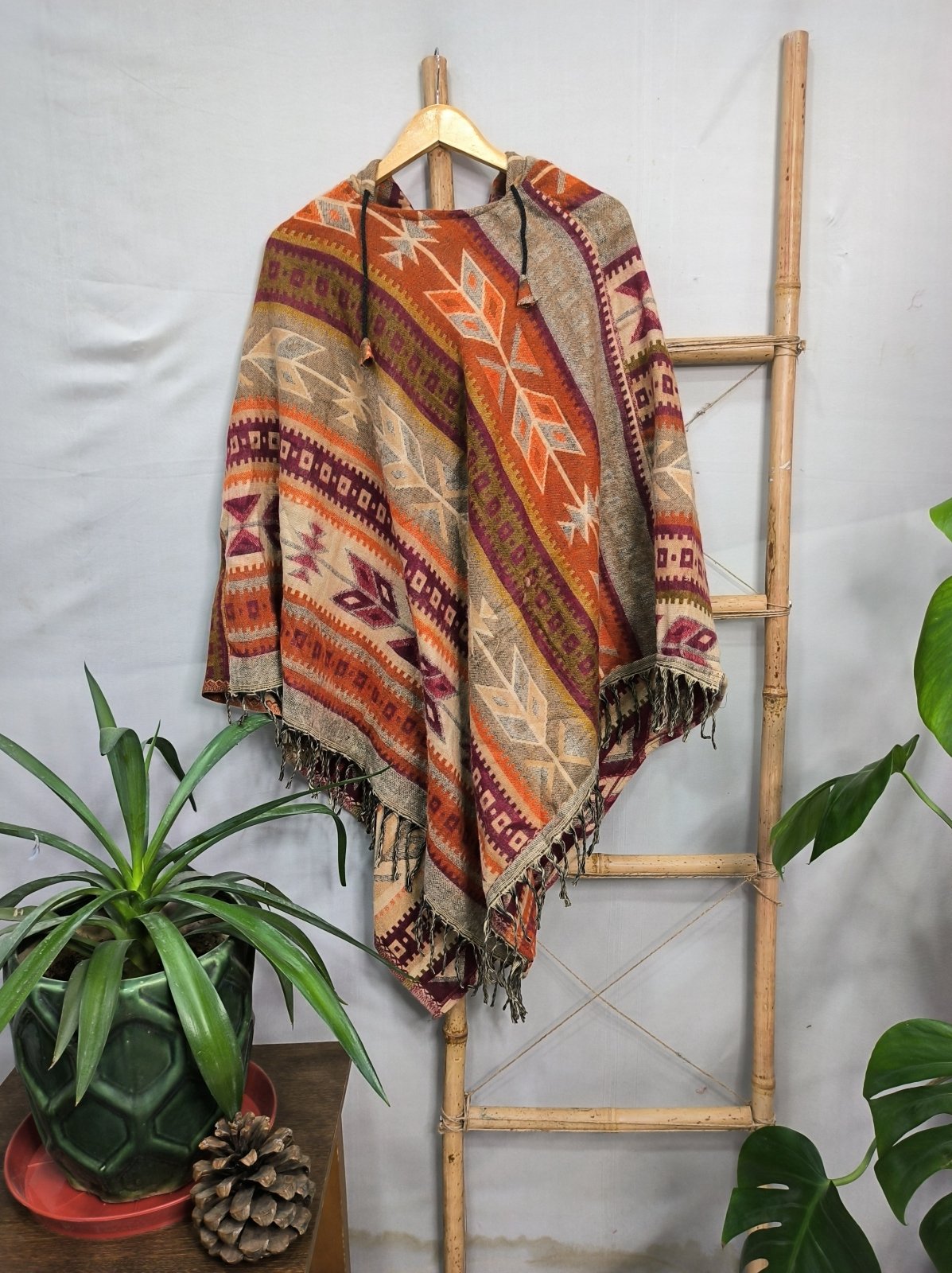 Unisex Yak Wool Blend Hooded Poncho in black red pink blue geometric
